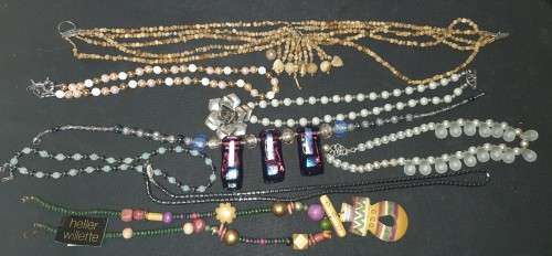 AN EXCLUSIVE VINTAGE JOBLOT COSTUME NECKLACES SOLD AS IS