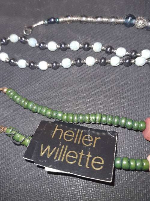 AN EXCLUSIVE VINTAGE JOBLOT COSTUME NECKLACES SOLD AS IS