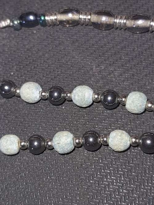 AN EXCLUSIVE VINTAGE JOBLOT COSTUME NECKLACES SOLD AS IS