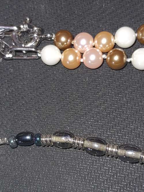 AN EXCLUSIVE VINTAGE JOBLOT COSTUME NECKLACES SOLD AS IS
