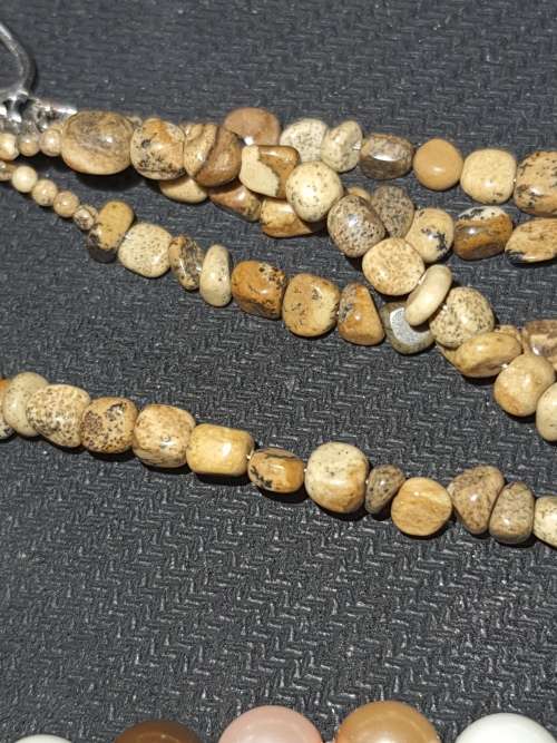 AN EXCLUSIVE VINTAGE JOBLOT COSTUME NECKLACES SOLD AS IS