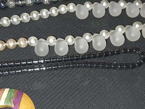 AN EXCLUSIVE VINTAGE JOBLOT COSTUME NECKLACES SOLD AS IS