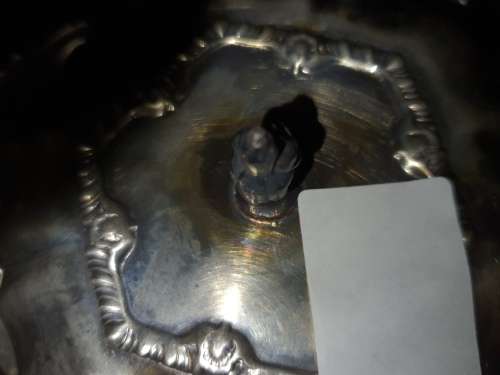 A SILVER PLATED SMALL TURINE IN GOOD CONDITION SOLD AS IS