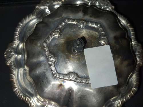 A SILVER PLATED SMALL TURINE IN GOOD CONDITION SOLD AS IS