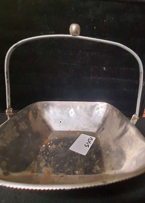 A SQUARE SILVER-PLATED SERVING BASKET TRAY SOLD AS IS