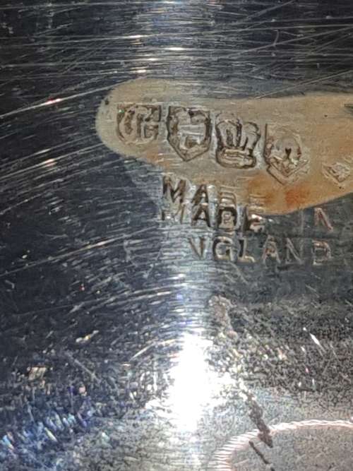 AN OVAL VINTAGE SILVER PLATED SERVING TRAY SOLD AS IS