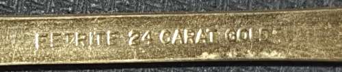 A SET OF EETRITE 24KT GOLD PLATED TEASPOONS