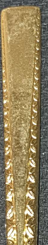 A SET OF EETRITE 24KT GOLD PLATED TEASPOONS