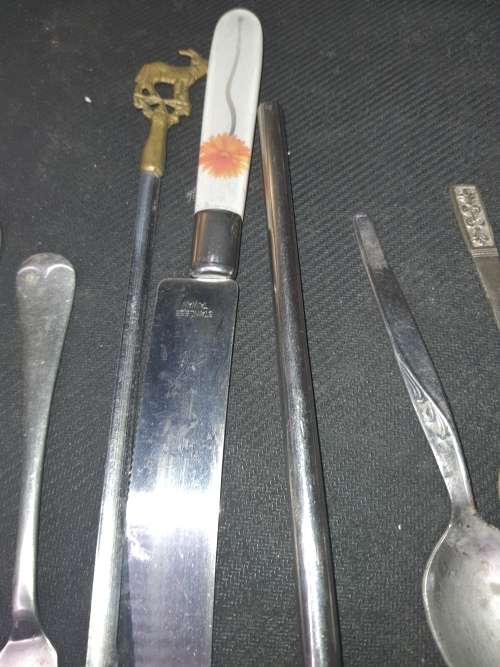 A VINTAGE JOBLOT CUTLERY SOLD AS IS