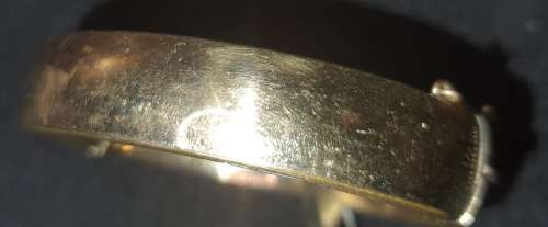 A vintage 9ct gold core bangle 21.8 grs ornately engraved, i