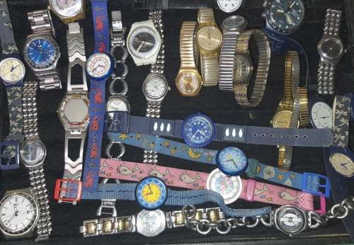A massive bulk job lot swatch watches i