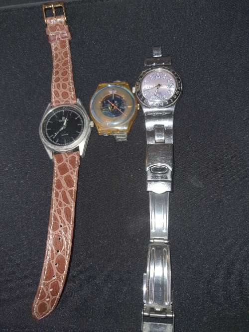A collection Swatch wrist watches sold as is not tested