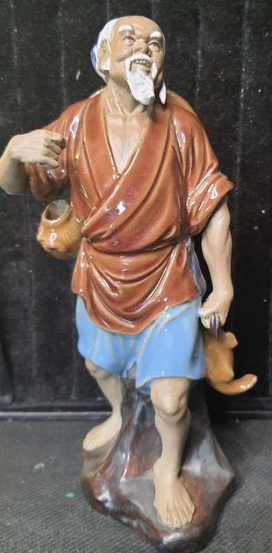 A VINTAGE CERAMIC - PORCELAN CHINESE CARP FISHER MAN IN GOOD CONDITION