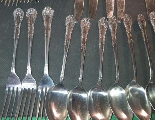 A VINTAGE FINEST QUALITY UNITY VULCAN STAINLESS STEEL 59 PIECE CUTLERY SET SOLD AS IS
