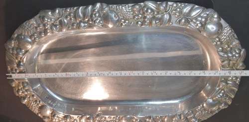 A VINTAGE ALLUMINIUM ALLOY OVAL HEAVY DUTY SERVING PLATTER