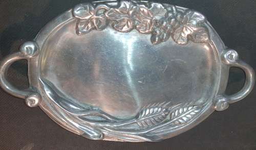 A VINTAGE CAST ALLUMINIUM ALLOY WTH AN ORNATE DESIGN SERVING TRAY MADE IN MEXICO