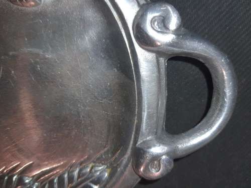 A VINTAGE CAST ALLUMINIUM ALLOY WTH AN ORNATE DESIGN SERVING TRAY MADE IN MEXICO
