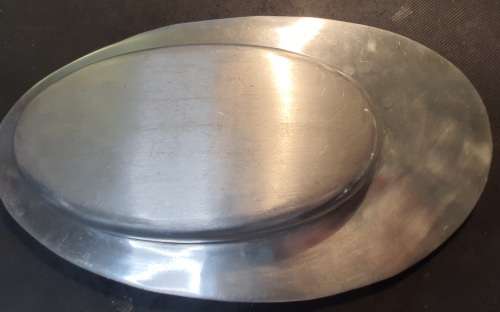 A VINTAGE ART DECO CAST ALUMINIUM ALLOY SERVING PLATTER SOLD AS IS