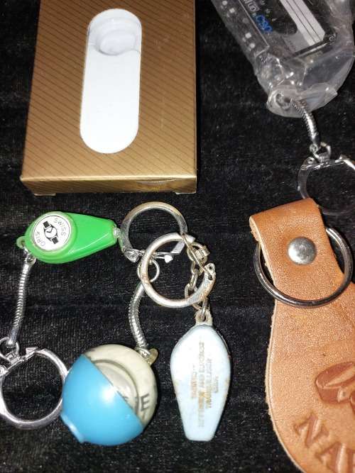 A VINTAGE JOBLOT KEY RINGS SOLD AS IS