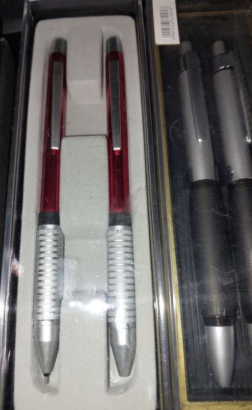 A VINTAGE JOBLOT ROLLER BALL AND PENCIL SETS SOLD AS IS