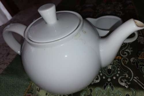 A BOARD MANS TEA JUG, SUGAR BOWL WITH A LID AND A MILK JUG IN GOOD CONDITION SOLD AS IS