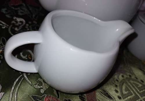 A BOARD MANS TEA JUG, SUGAR BOWL WITH A LID AND A MILK JUG IN GOOD CONDITION SOLD AS IS