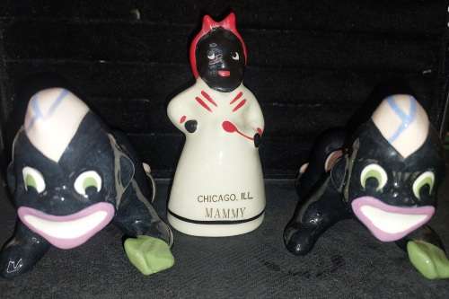 A collection of American folk art ceramic figurines in good condition sold as is