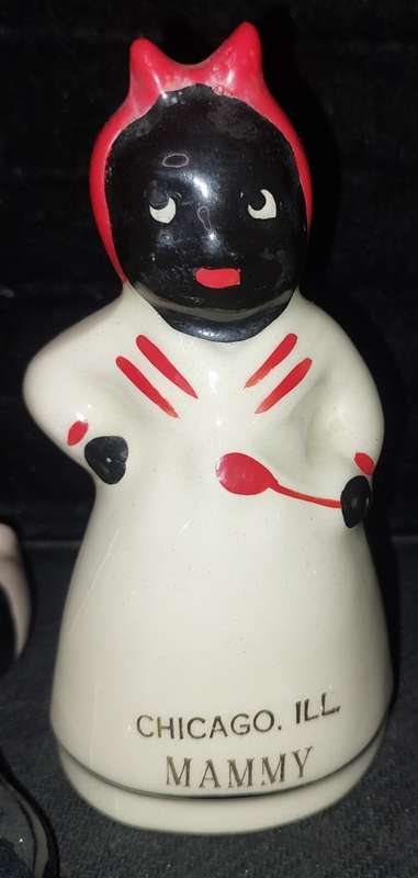 A collection of American folk art ceramic figurines in good condition sold as is