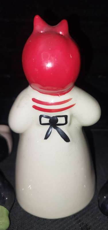 A collection of American folk art ceramic figurines in good condition sold as is