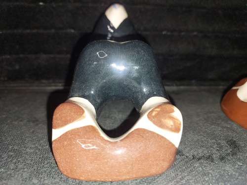 A collection of American folk art ceramic figurines in good condition sold as is