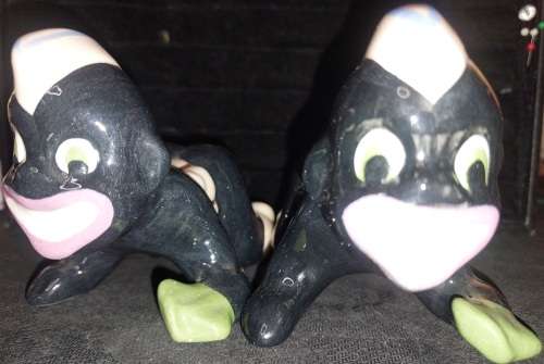 A collection of American folk art ceramic figurines in good condition sold as is