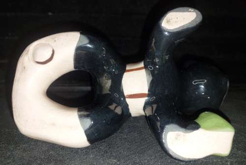 A collection of American folk art ceramic figurines in good condition sold as is