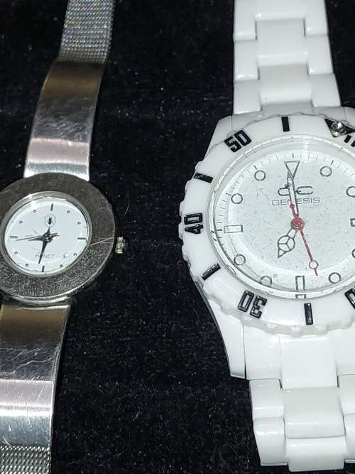 A COLLECTION WOMANS QUARTZ WATCHES SOLD AS IS NOT TESTED