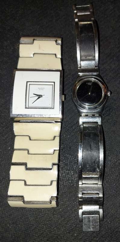 TWO VINTAGE LADIES` SWATCH WATCHES IN WORKING CONDITION SOLD AS IS