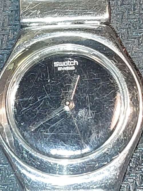 TWO VINTAGE LADIES` SWATCH WATCHES IN WORKING CONDITION SOLD AS IS