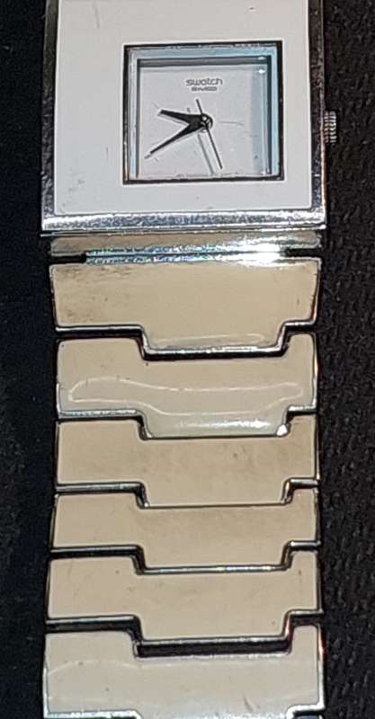 TWO VINTAGE LADIES` SWATCH WATCHES IN WORKING CONDITION SOLD AS IS
