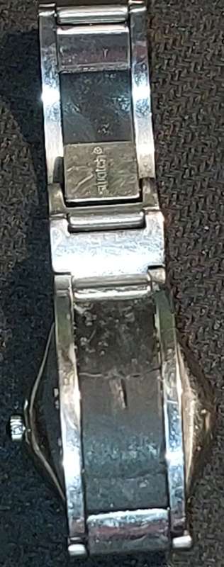 TWO VINTAGE LADIES` SWATCH WATCHES IN WORKING CONDITION SOLD AS IS
