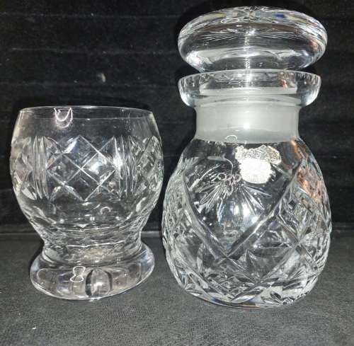 A VINTAGE ENGLISH CRYSTAL DECANTER AND A GLASS