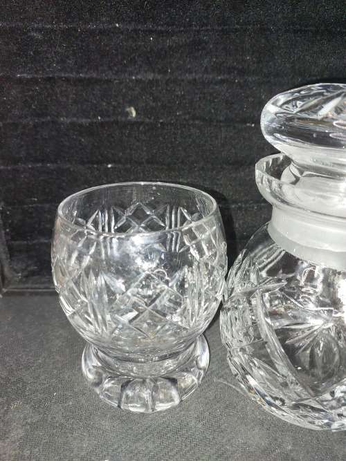 A VINTAGE ENGLISH CRYSTAL DECANTER AND A GLASS