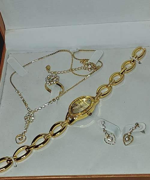 2 PERFACT AND COMPLETE GOLD-PLATED COSTUME JEWELRY SETS BY ROMIL AND AIM SOLD AS IS