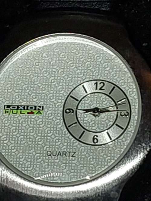 A SET OF LOXION KULCA WATCHES SOLD AS IS NOT TESTED