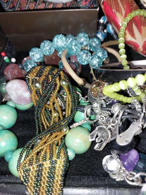 A BULK VINTAGE JOBLOT BRACELETS AND RARE BANGLES  OF QUAITY SOLD AS IS