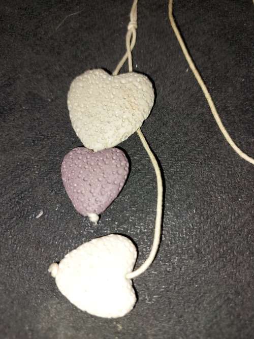 A COLLECTION OF SEA CORAL PENDANT NECKLACES SOLD AS IS