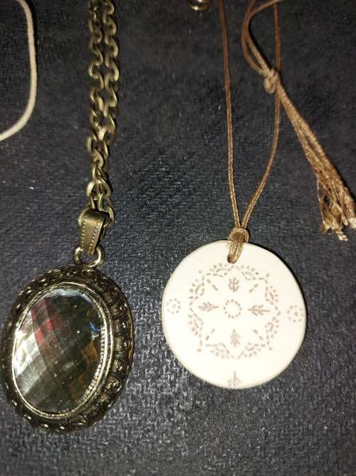 A COLLECTION OF SEA CORAL PENDANT NECKLACES SOLD AS IS