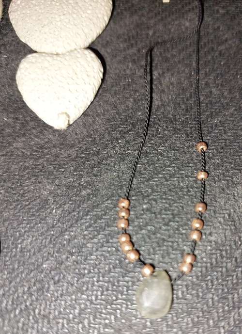 A COLLECTION OF SEA CORAL PENDANT NECKLACES SOLD AS IS