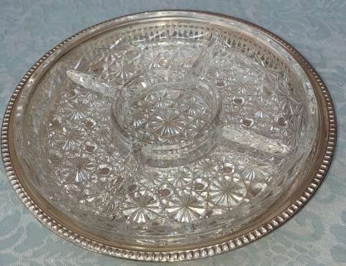 A VINTAGE LARGE APPROXIMATELY 32CM SIZE LAZI SUZI SILVER PLATED AND A GLASS INNER TRAY