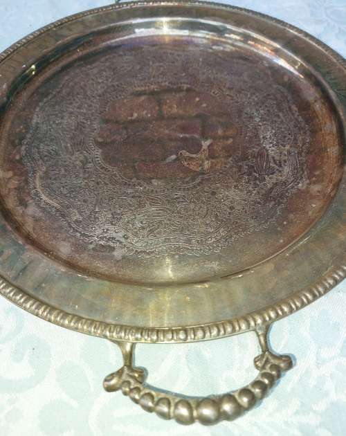 TWO ANTIQUE SILVER-PLATED SERVING TRAYS SOLD AS IS