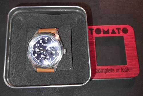 A UNISEX TAMATO WRISTWATCH SOLD AS IS NOT TESTED