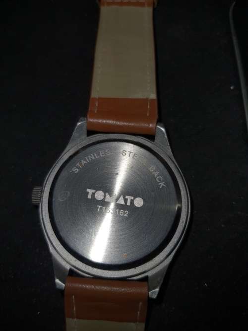 A UNISEX TAMATO WRISTWATCH SOLD AS IS NOT TESTED