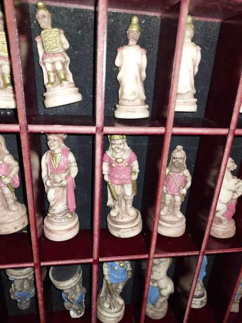 A VINTAGE CHESS BOARD AND STORAGE COMPARTMENT WITH ALL THE PIECES COMPLETE SET PIECES ARE CERAMIC